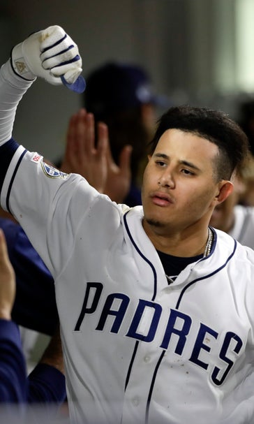 Machado’s grand slam carries Padres over Harper’s Phillies